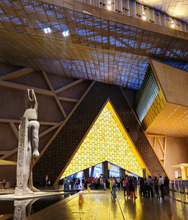 The Grand Hall of the Grand Egyptian Museum lit up at night