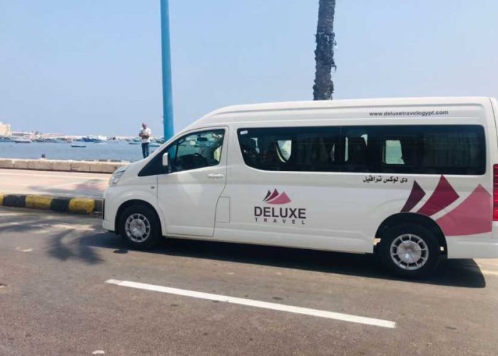 Deluxe Travel Egypt private minivan on the seafront for a Sharm El Sheikh airport transfer