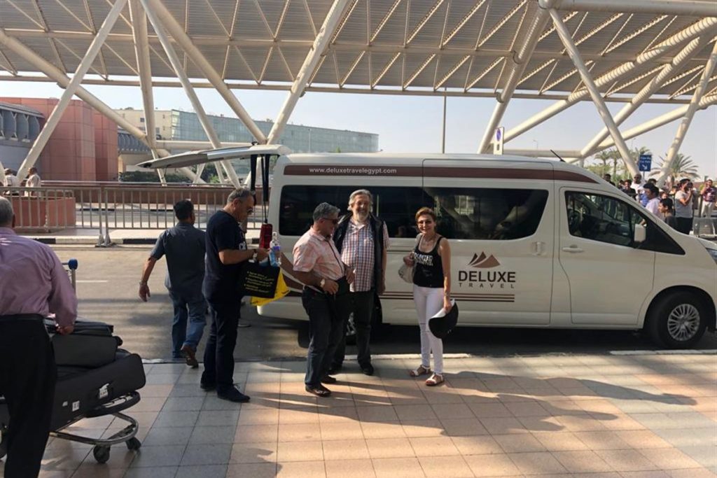 Deluxe Travel Egypt representative meeting guests at Cairo Airport