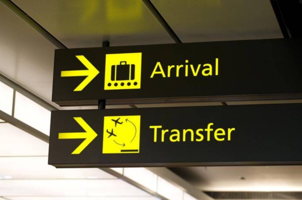 Arrival signs inside Cairo International Airport where travellers buy a visa on arrival