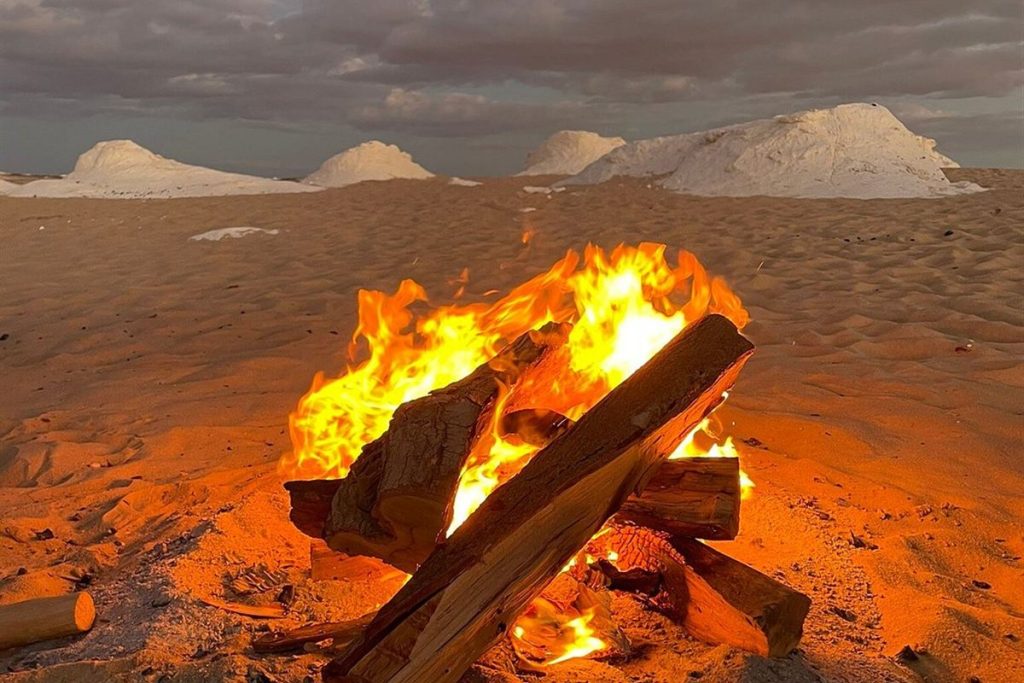 Campfire at night in the White Desert