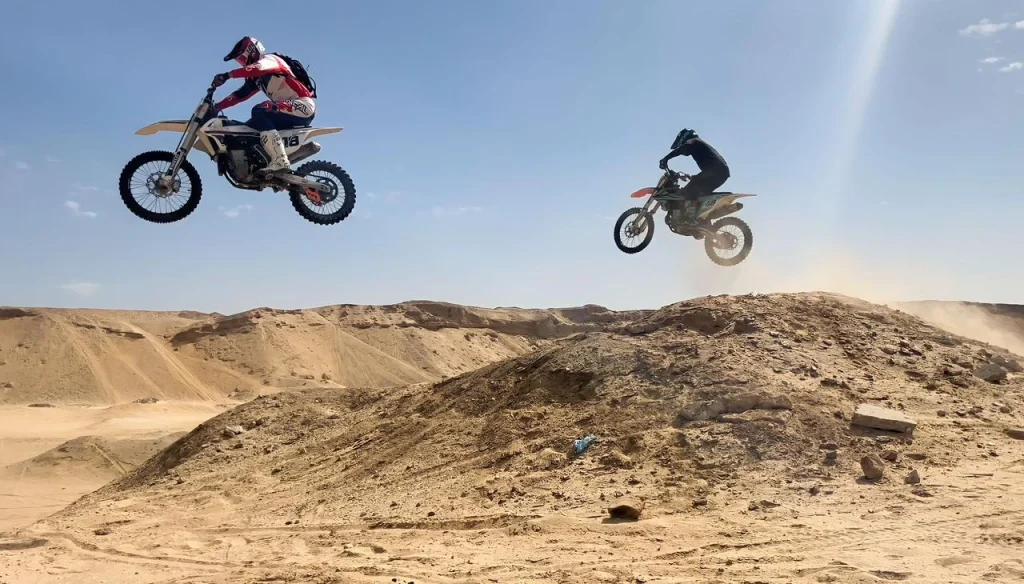 Dirt bike rider in the desert, Egypt