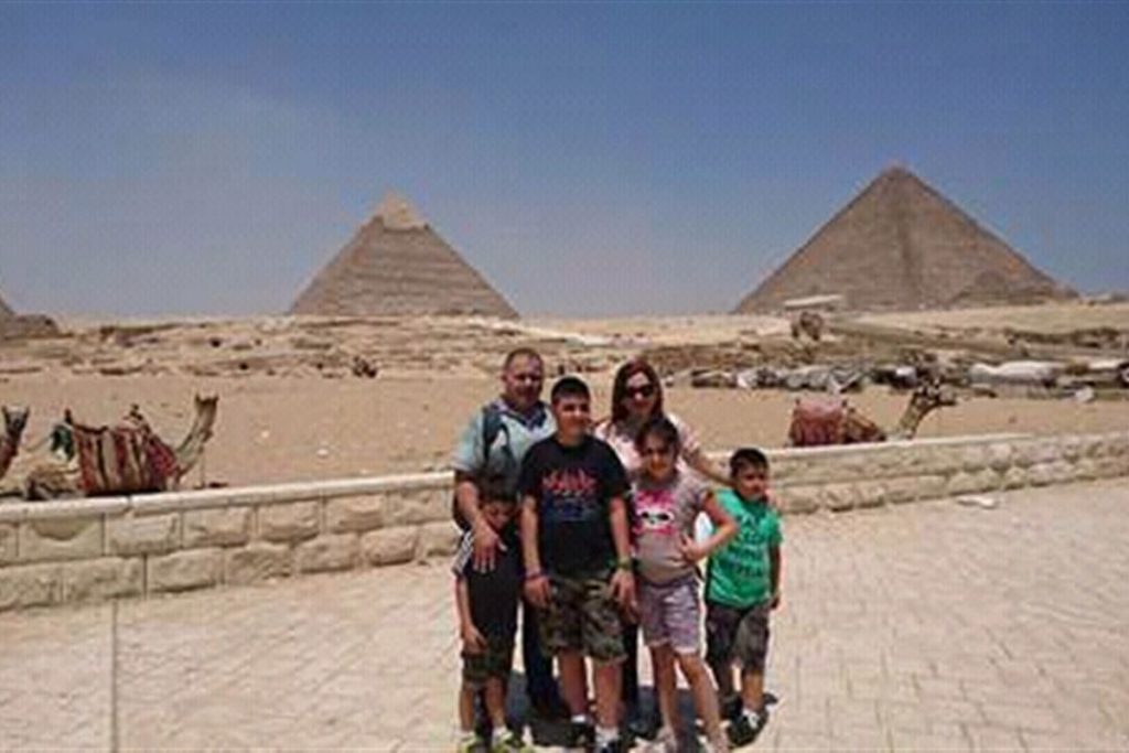 Family on a private tour at the Pyramids of Giza