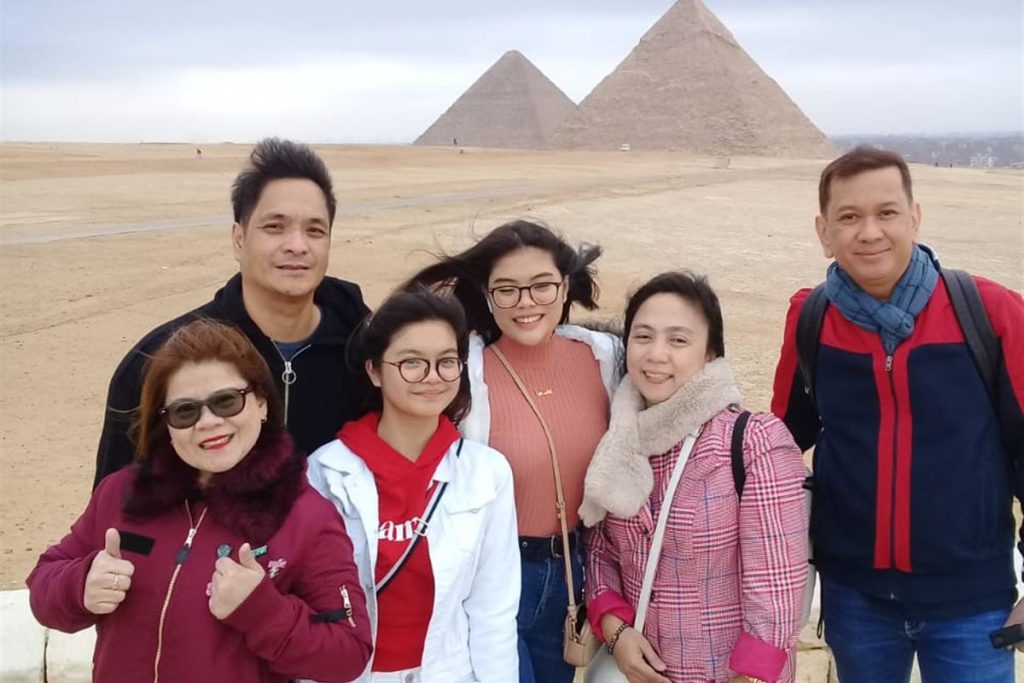 Family on a private tour at the Pyramids of Giza