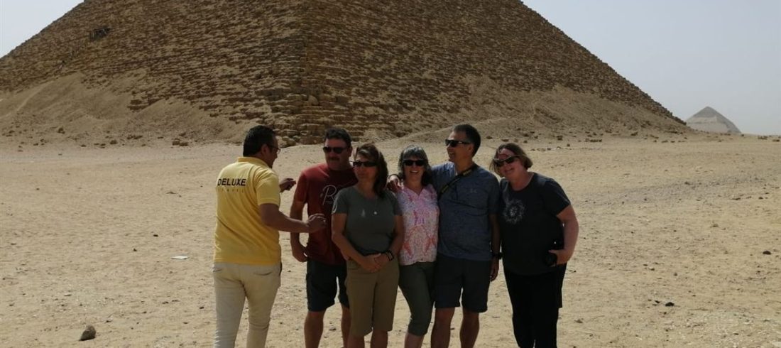 Egyptologist guide with guests at the Great Pyramid