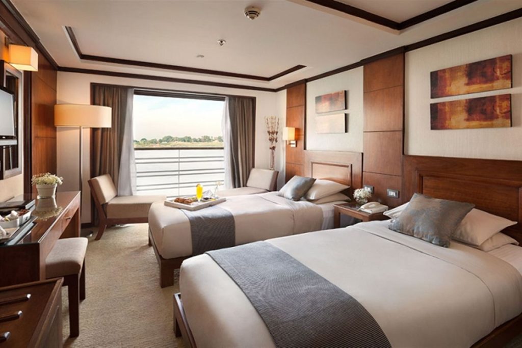 Nile cruise cabin with a window on the river