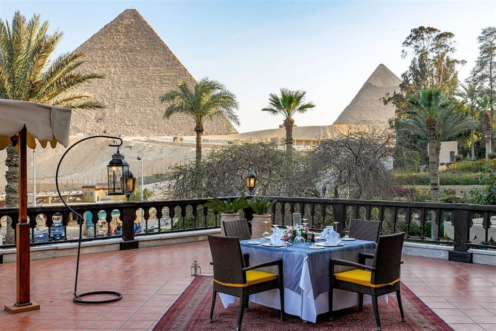 View of the Giza Pyramids from a hotel terrace in Giza