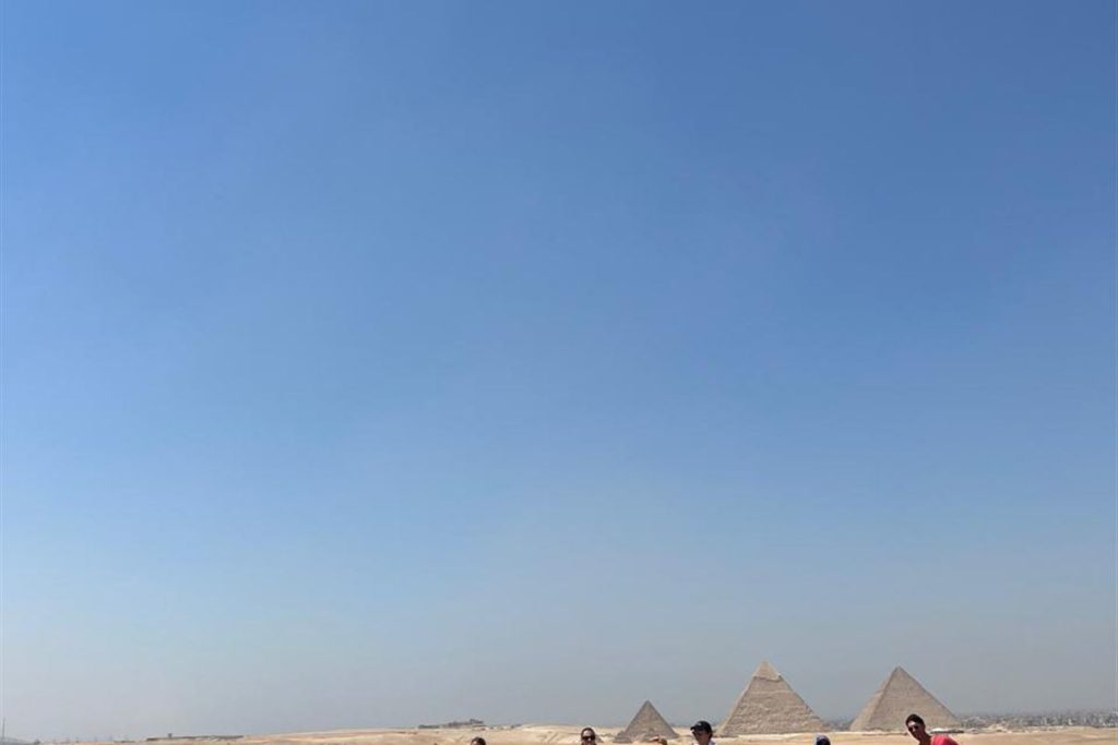 Quad bikes lined up in the desert near the Giza Pyramids
