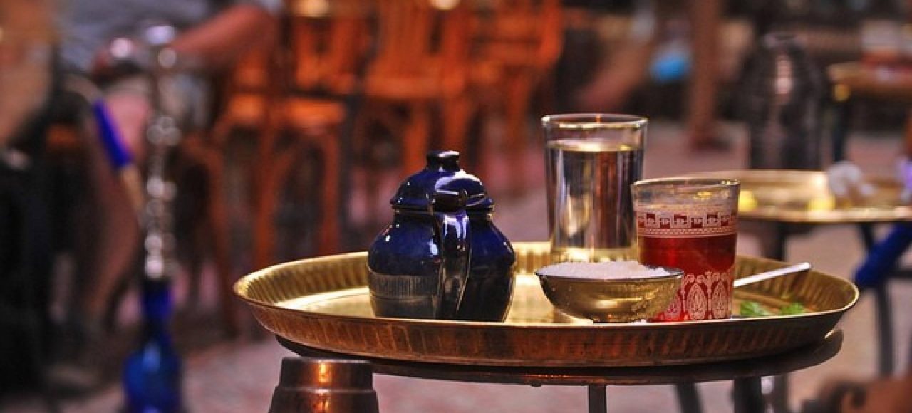 Tea glasses and shisha at a traditional cafe in Khan el-Khalili, Cairo