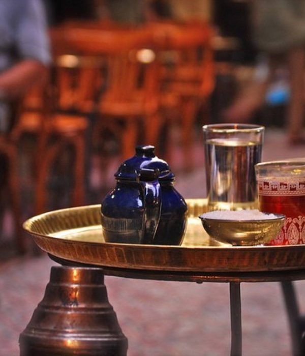 Tea glasses and shisha at a traditional cafe in Khan el-Khalili, Cairo