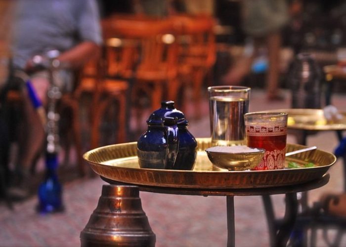 Tea glasses and shisha at a traditional cafe in Khan el-Khalili, Cairo